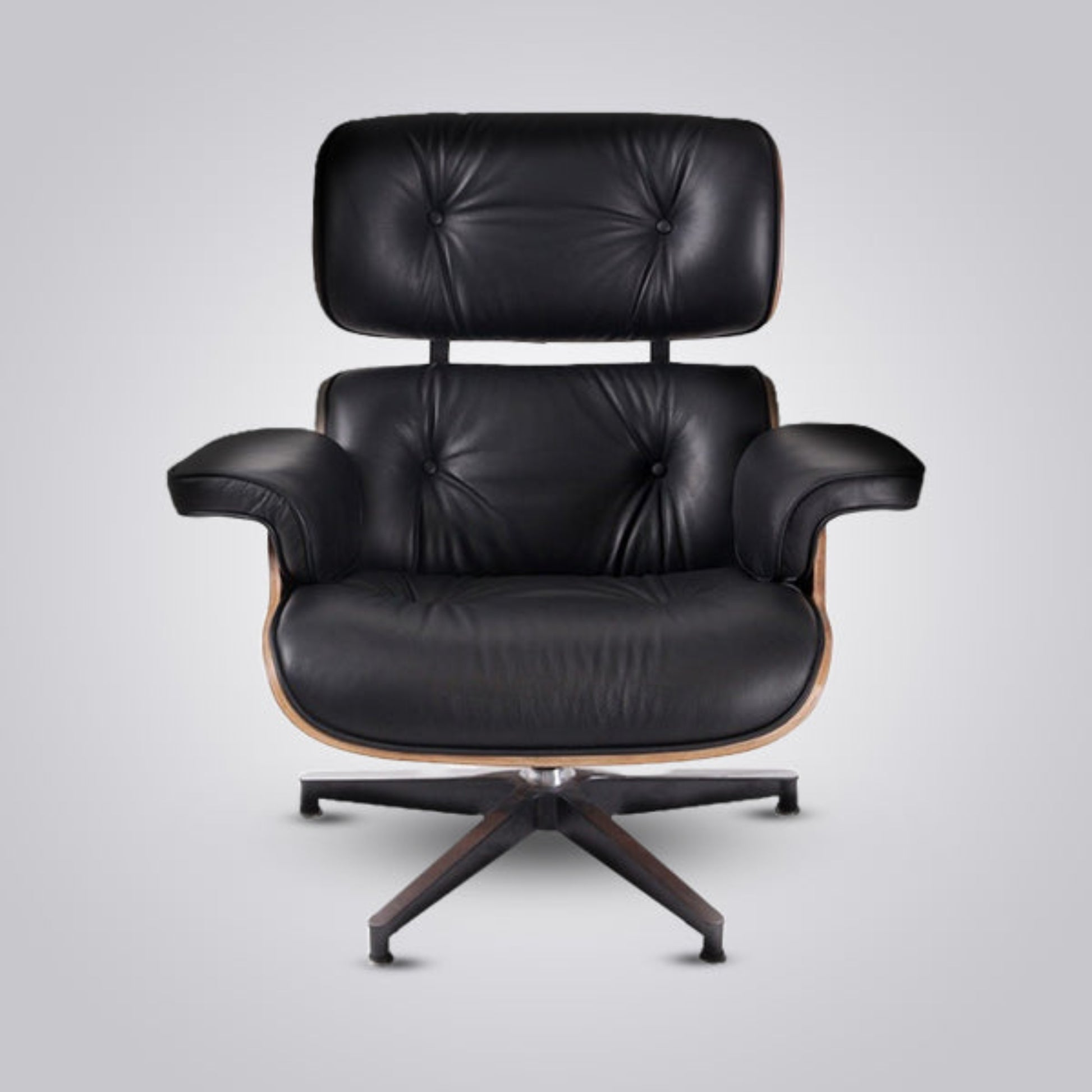 Black leather armchair with wooden base on a light gray background