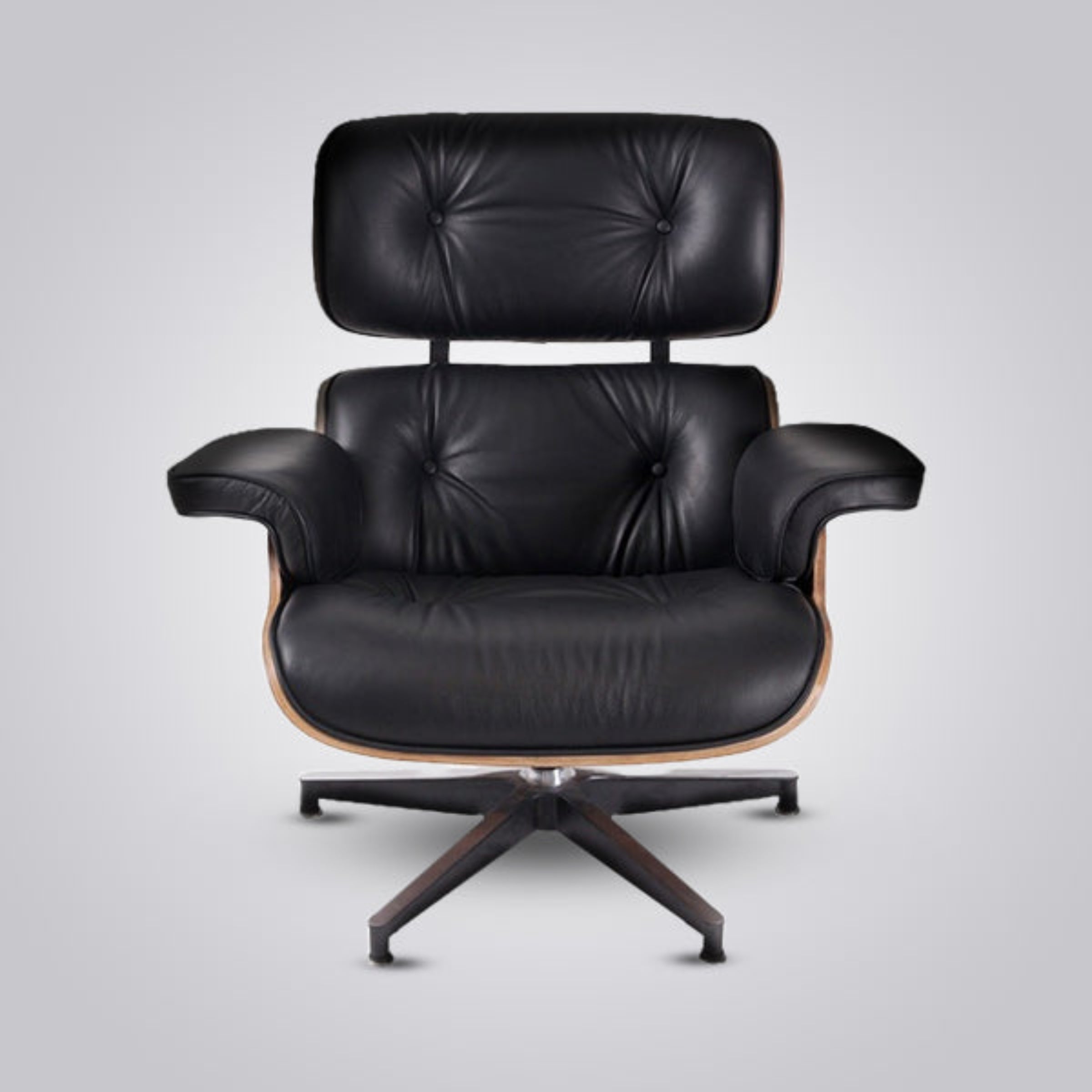 Black leather armchair with wooden base on a light gray background