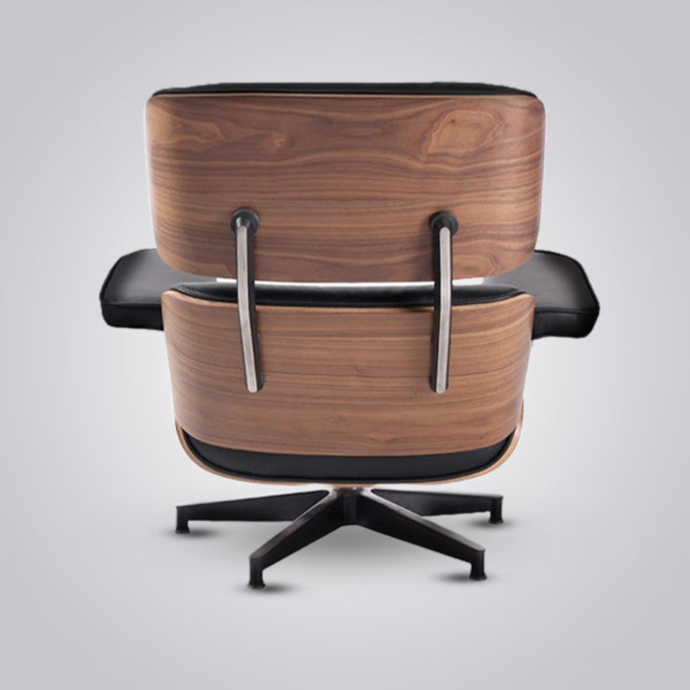 Wooden chair with black accents on a gray background