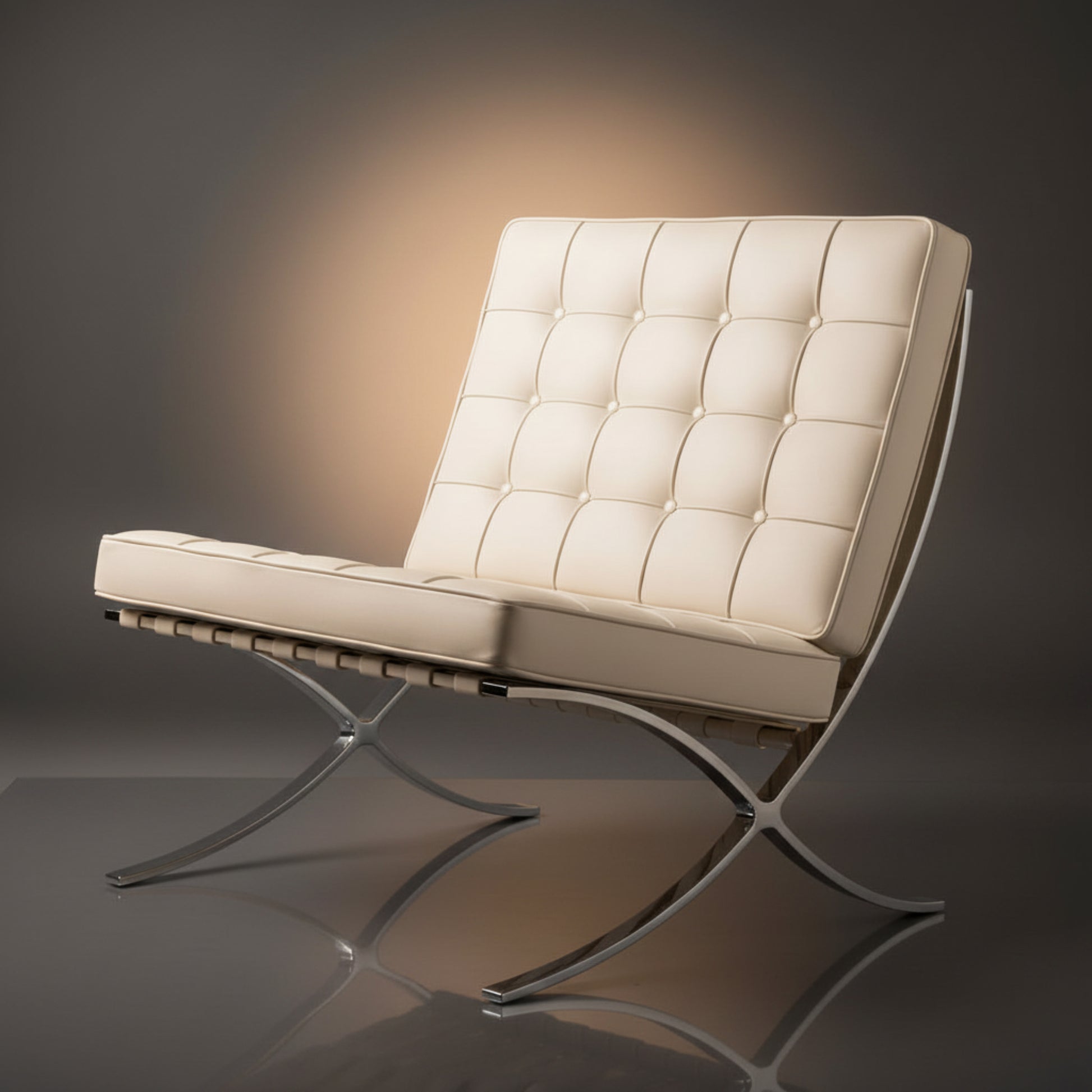 A modern tufted leather armchair with a chrome metal frame, shown on a dark gray reflective studio. 