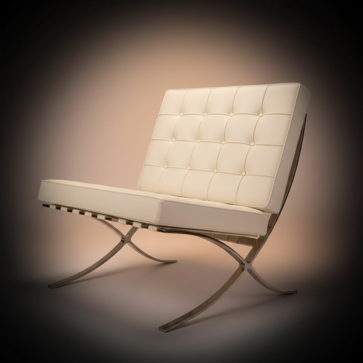 A modern lounge chair with a tufted cream-white leather seat and backrest, supported by a chrome X-frame base.