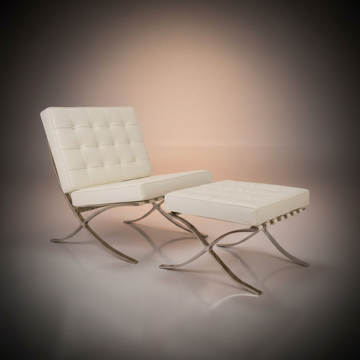 A modern tufted lounge chair with a matching ottoman, upholstered in off-white leather with polished chrome