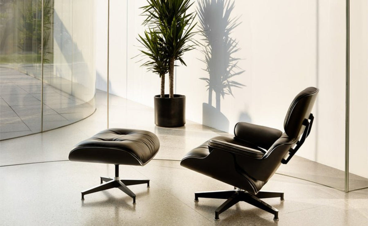 Charles Eames inspired all black lounge chair and ottoman in ebony ash wood