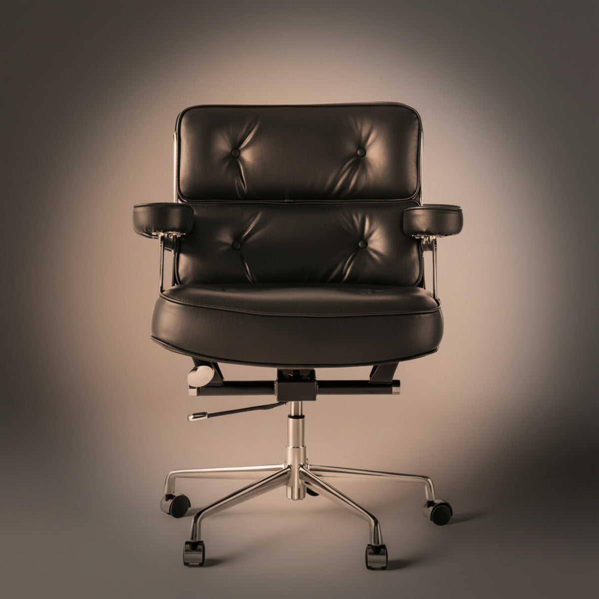 A black leather office chair with a tufted backrest, padded armrests, and a chrome five-star wheeled base.