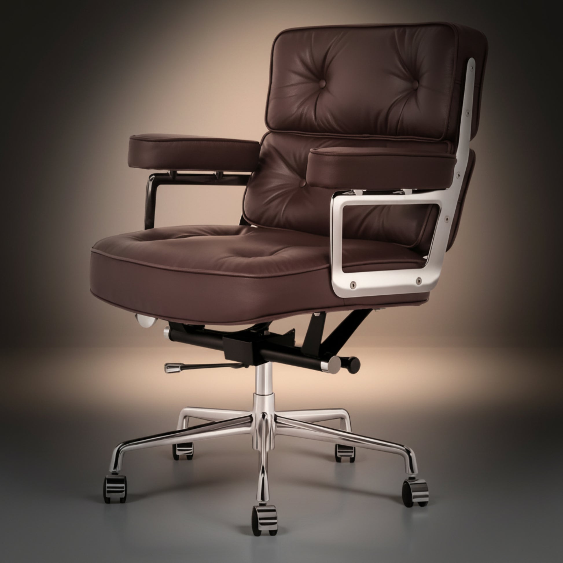 A modern office chair with deep tufted brown leather upholstery, a chrome five-star base, and silver metal side supports.
