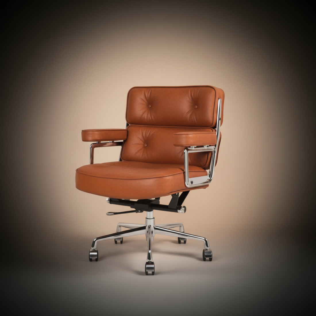 A mid-century modern office chair with tufted cognac brown leather upholstery and polished chrome metal armrests and base.