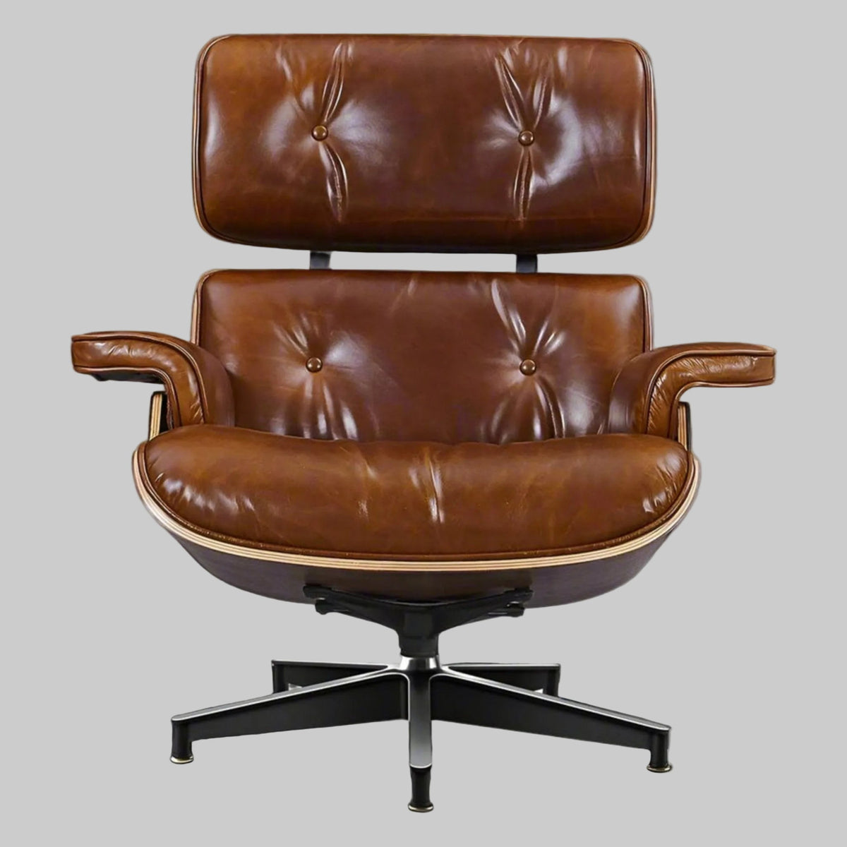 Brown leather chair with a gray background eames-lounge-chair-ottoman-xl-walnut-waxed-tan-brown-1 Aura Furnitures