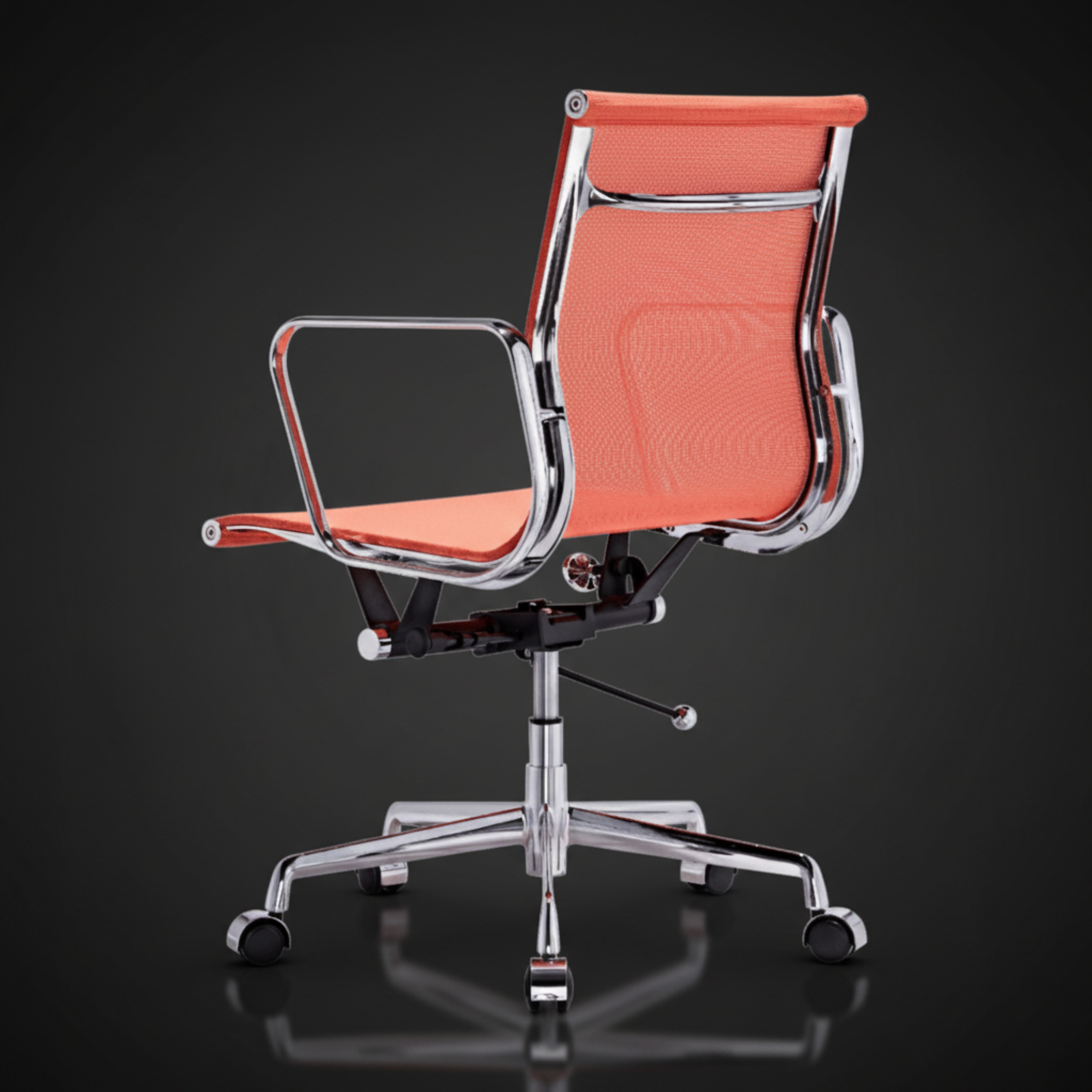 An office chair with a bright orange mesh seat and backrest, supported by a polished chrome base.