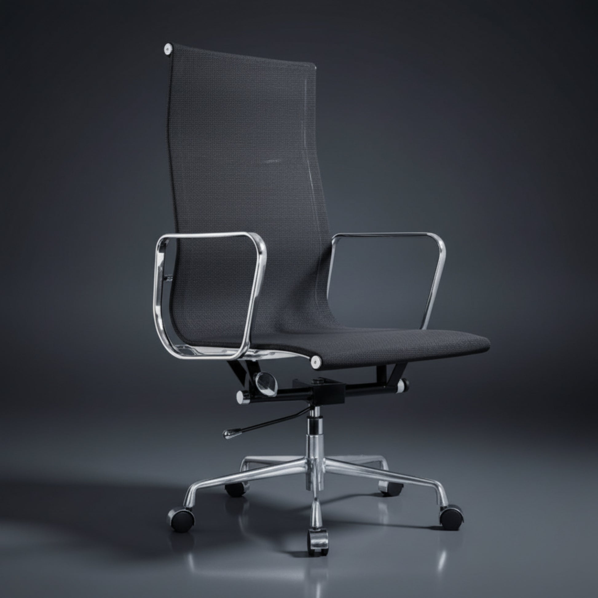 A modern high-back office chair with a black mesh back and seat, supported by a polished chrome base.