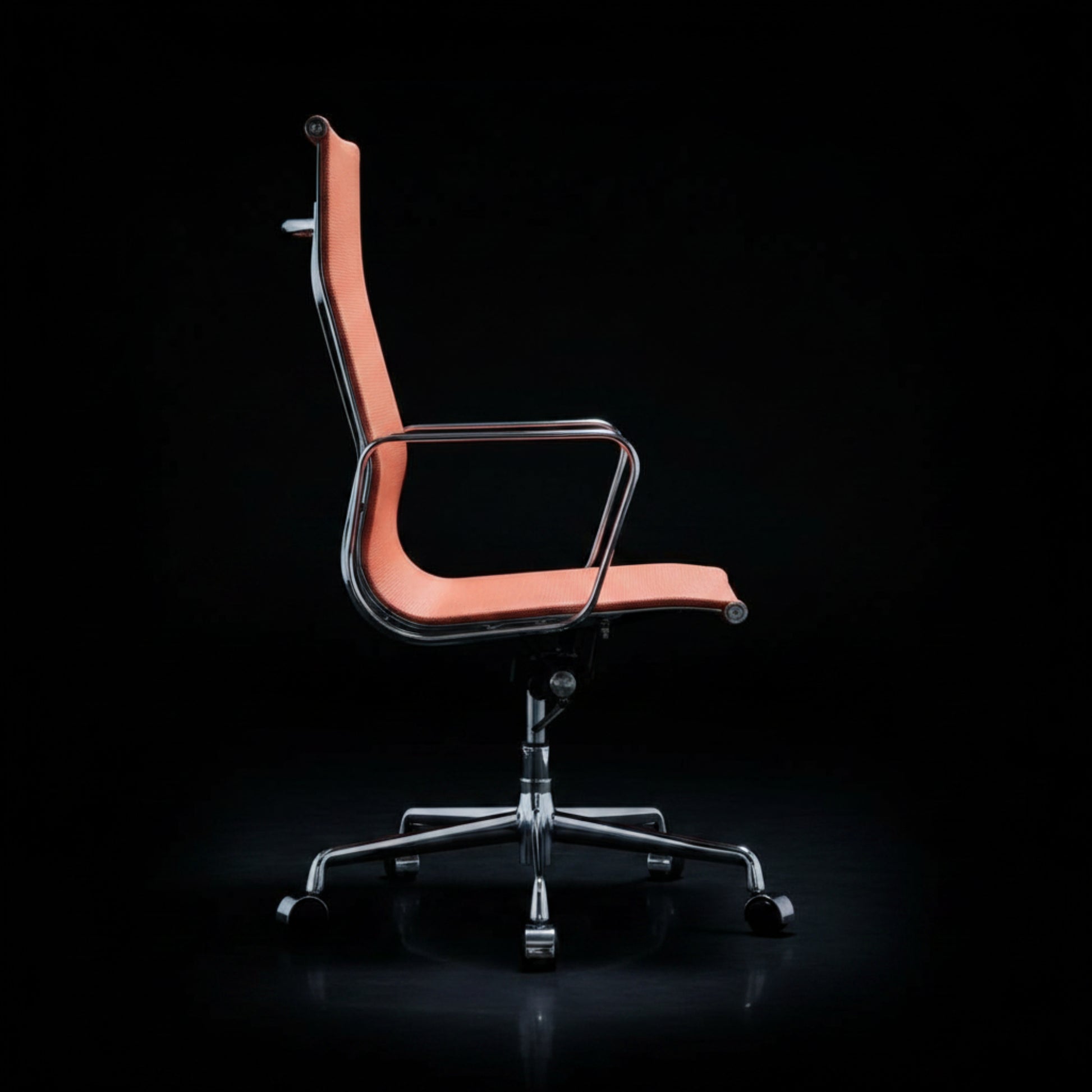 A modern office chair with a curved orange-pink upholstered seat and backrest.