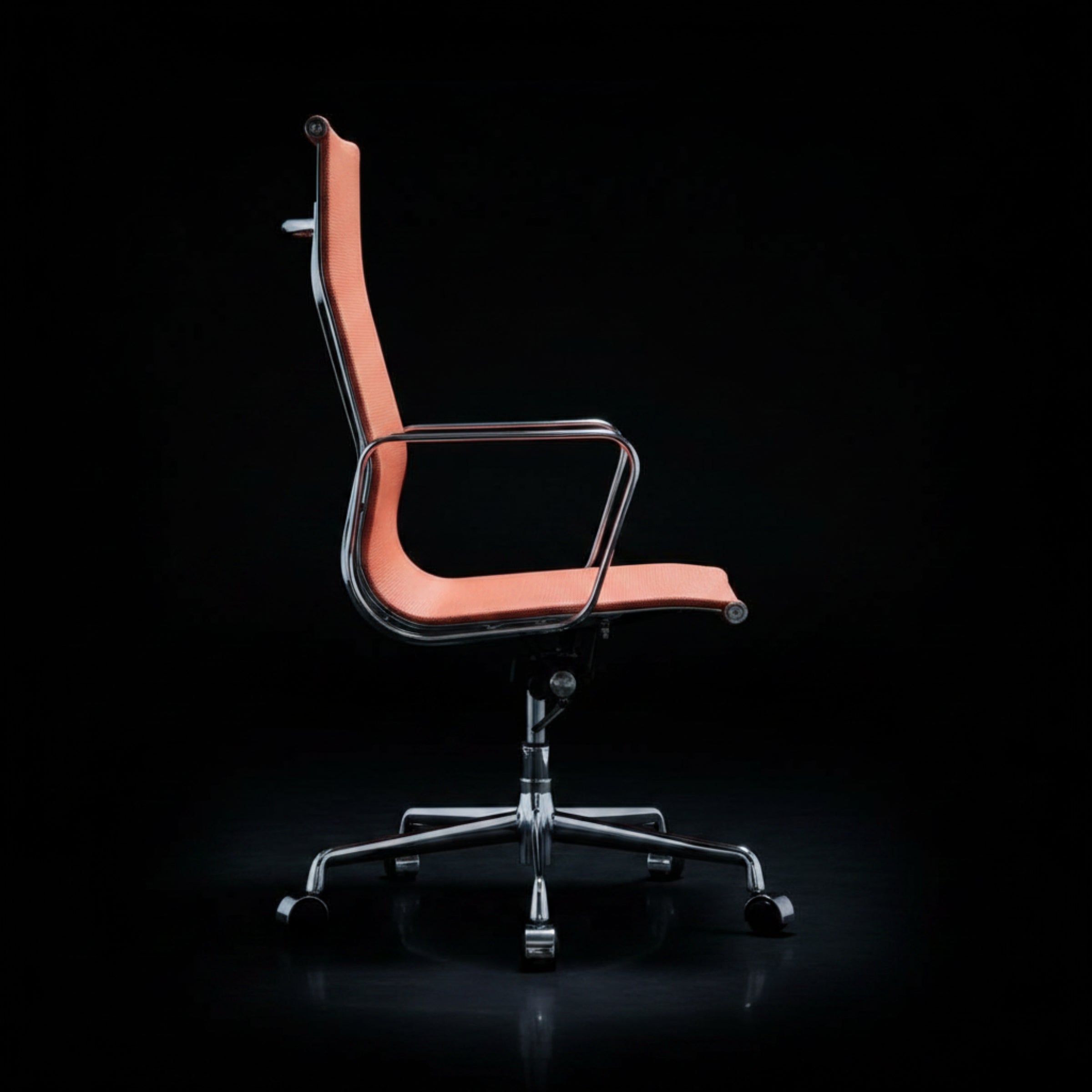 A modern office chair with a curved orange-pink upholstered seat and backrest.