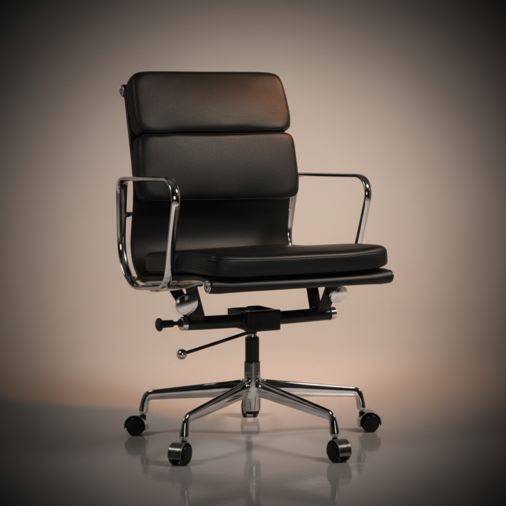 Black office chair with chrome base on a white background eames-soft-pad-office-chair-ea-217-low-back-black-1