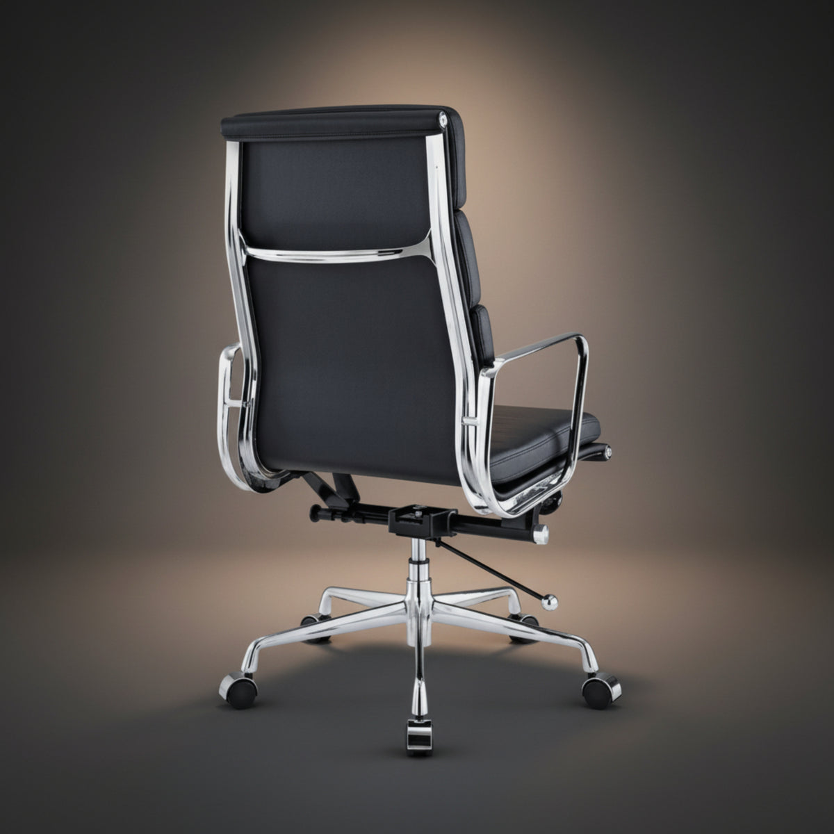 A modern black leather office chair with a high back, chrome metal frame, and a five-star wheeled base.