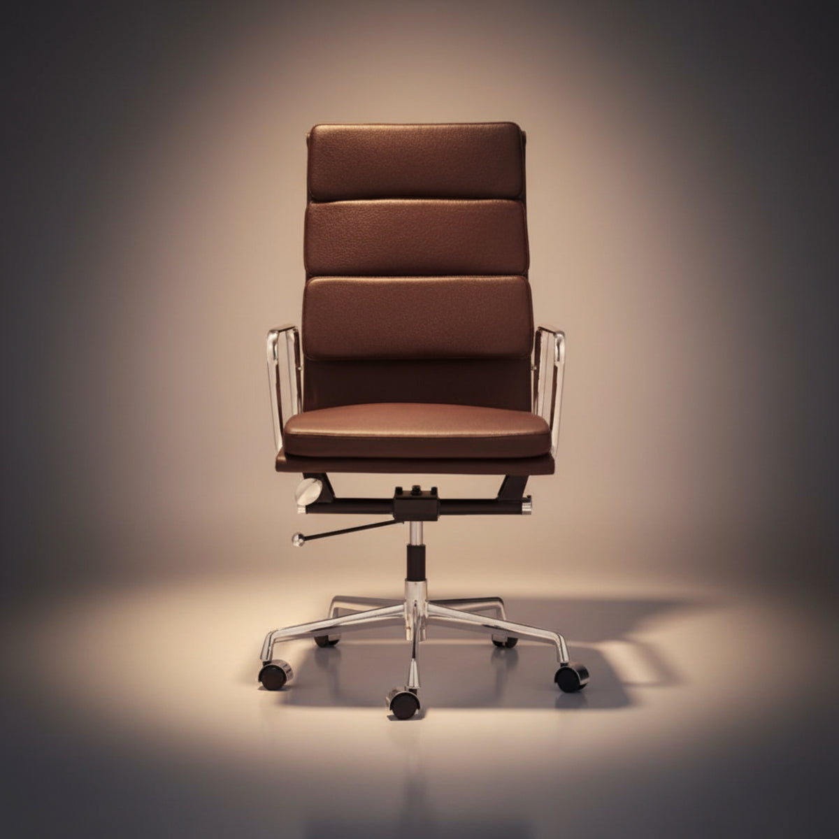 A modern high-back office chair with brown padded upholstery and a chrome five-star base.