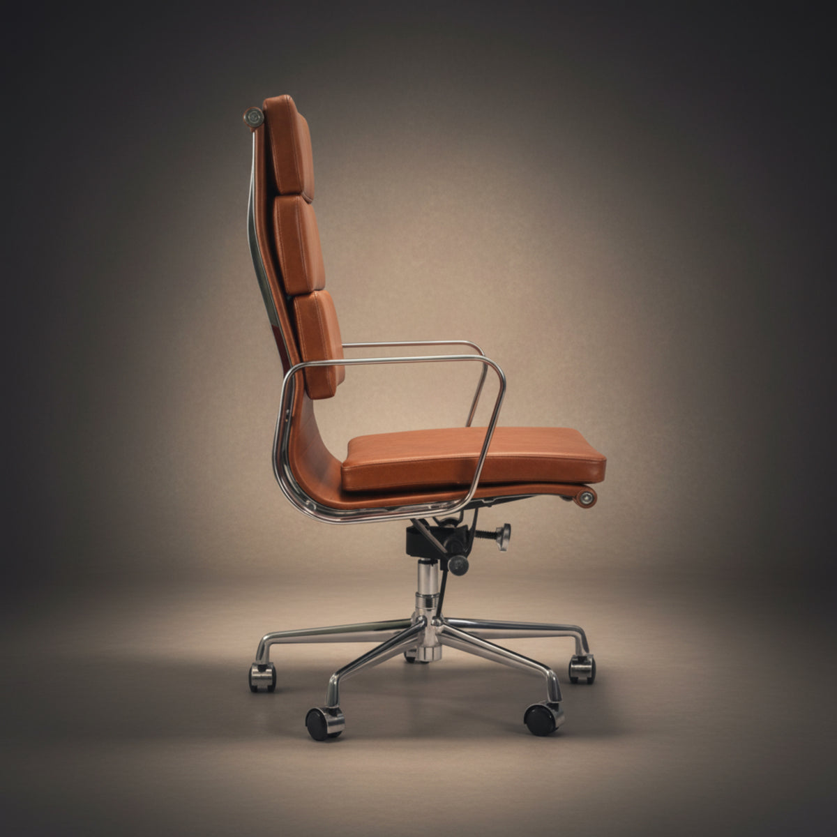 A modern high-back office chair with orange-brown leather upholstery and a chrome five-star base