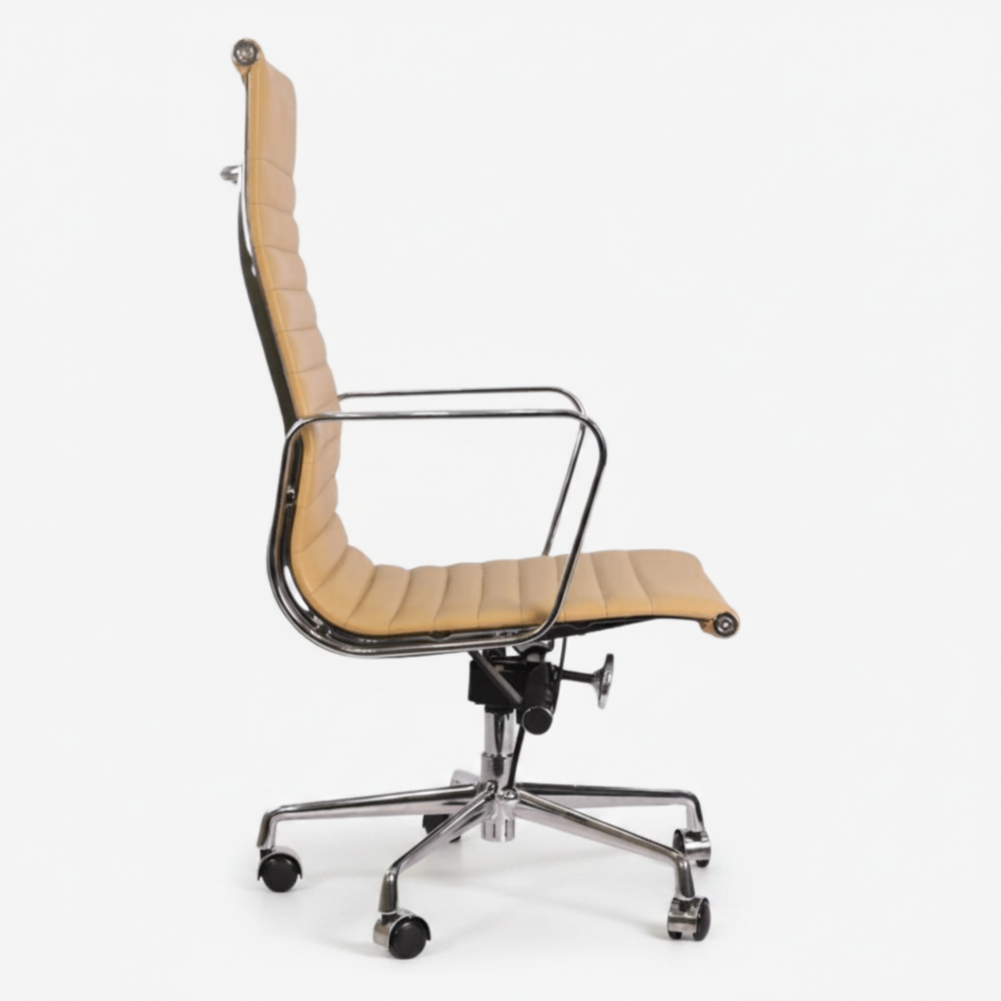 A modern high-back office chair with a curved, ribbed tan leather seat and backrest
